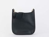 a black leather purse with a gold chain on the handle
