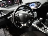 the interior of a car with a steering wheel and dashboard controls