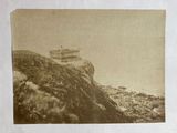 an old photo of a lighthouse on top of a mountain