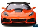 a close up of an orange sports car on a white background