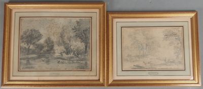 deux tableaux encadrés représentant des arbres et une rivière dans un cadre doré