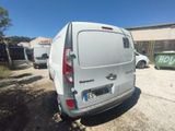 a white van that is parked in a lot