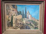 a picture of a painting hanging on a red wall