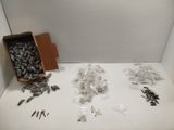 a box full of screws and screws on a table