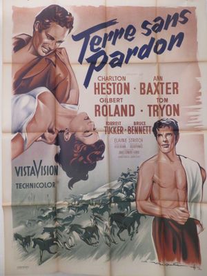 une vieille affiche de cinéma représentant un homme et une femme à cheval