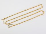 a set of three gold chain necklaces