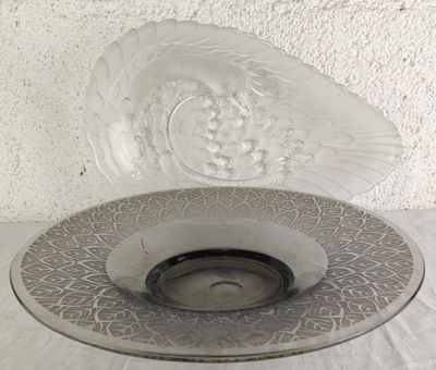 a plate with a bowl on it sitting on a table