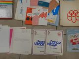 a lot of books and papers on the floor