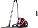 un gros plan sur un aspirateur rouge et un aspirateur noir et blanc