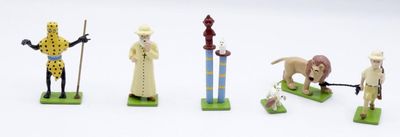 four figurines of different types of people and animals