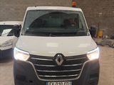 a picture of a white van parked in a garage