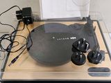 a turntable that is sitting on top of a table