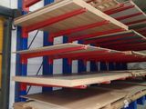 a close up of a rack of shelves in a warehouse