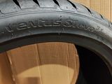 a close up of a tire on a cardboard box