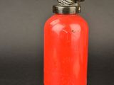 fire extinguisor bottle with a bird on top of it