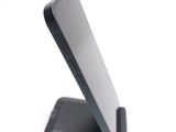 a close up of a cell phone on a stand