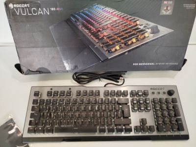 a box with a keyboard and a mouse on the table