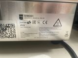 an image of a close up of a machine with a qr code on it