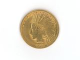 a gold coin with an indian head on it