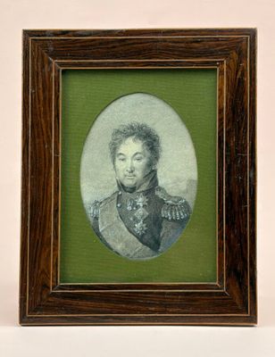 portrait of a man in a military uniform in a wooden frame