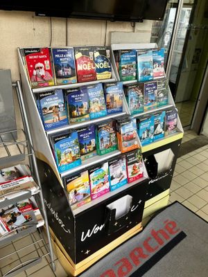 a lot of books on the shelves in the store