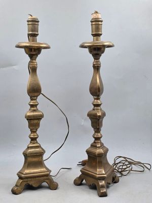 pair of antique brass candlesticks with turned bases