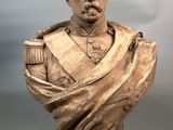 statue of a bust of a man in a military uniform