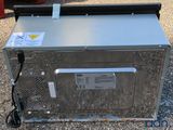 a close up of a metal box with a sign on it