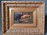 une photo d'un tableau représentant un cochon, dans un cadre en bois