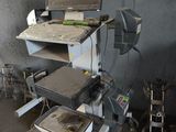 a computer desk with a monitor on top of it