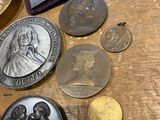 a table with a lot of coins and coins on it