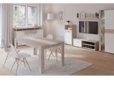 a picture of a living room with a table and chairs