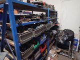a room with a lot of tools on the shelves