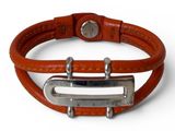 an orange leather bracelet with a metal clasp on a white background