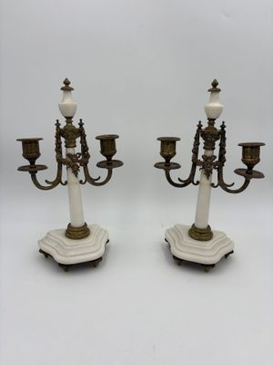 pair of antique brass candelabs with white marble bases