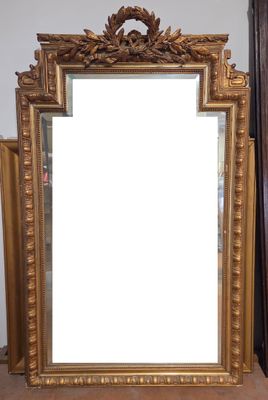 a mirror that is sitting on a table next to a mirror