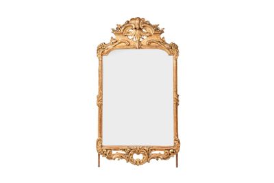 une image d'un miroir encadré d'or sur un fond blanc
