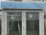 a large window that is sitting in the back of a truck