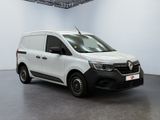 the white van is parked in a large room