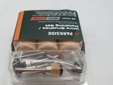 a package of screws in a package on a white surface