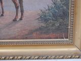 a painting of a man riding a horse in the desert