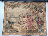 a tapestry hanging on the wall of a room