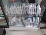 a display case full of toothbrushes and toothpaste