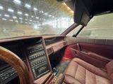 a dashboard of a car with a steering wheel and a dash board