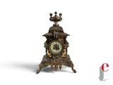 a clock that is sitting on top of a table
