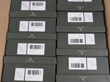 several boxes of black and white barcodes are stacked on top of each other