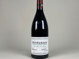 la bouteille de vin rouge est posée sur la table