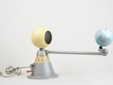 a light that has a globe on top of it