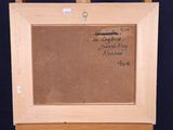 a picture of a painting on a easel with writing on it