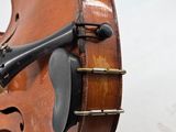 a close up of a violin with a bow on it